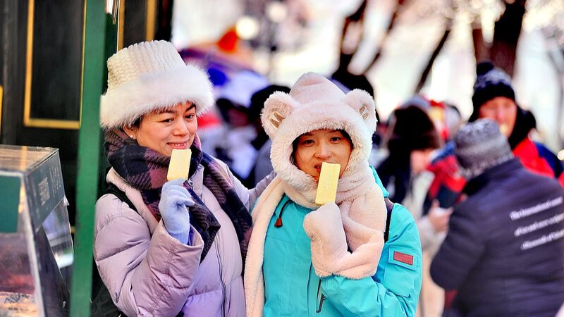 Harbin_s_Icy_Delight__Enjoying_Popsicles_on_a_Snowy_Central_Street