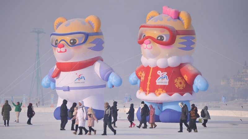 Harbins_Tiger_Mascots_Binbin_and_Nini_Welcome_Visitors_Ahead_of_2025_Asian_Winter_Games - Khabar Asia Harbin's Tiger Mascots 'Binbin' and 'Nini' Welcome Visitors Ahead of 2025 Asian Winter Games