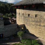 Harmony in Stone and Earth: The Craftsmanship of Tulou Construction