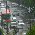 Heavy Rains Cause Severe Waterlogging in New Delhi, Disrupting Daily Life