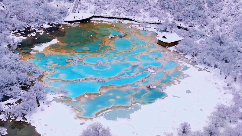 Huanglong Transforms into a Snow-Covered Fairyland During May Day Holiday video poster