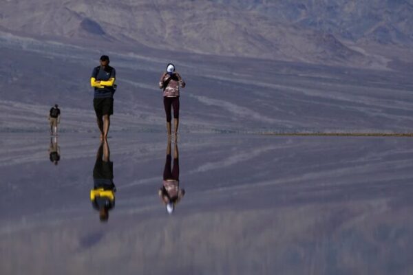 Kayakers Explore Rare Lake in Death Valley After Unprecedented Rains Kayakers Explore Rare Lake in Death Valley After Unprecedented Rains