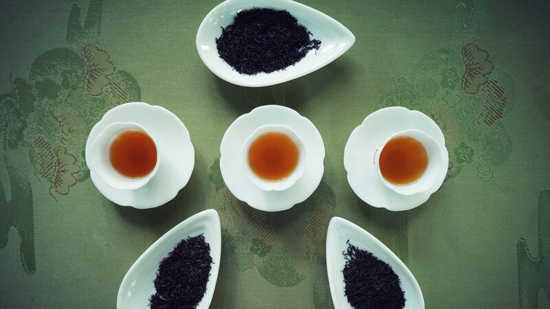 Keemun_Black_Tea_A_Regal_Brew_from_Chinas_Qimen_County - Khabar Asia Keemun Black Tea: A Regal Brew from China's Qimen County