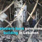 Lebanon Protesters Torch Government Building Amid Strict COVID-19 Lockdown video poster