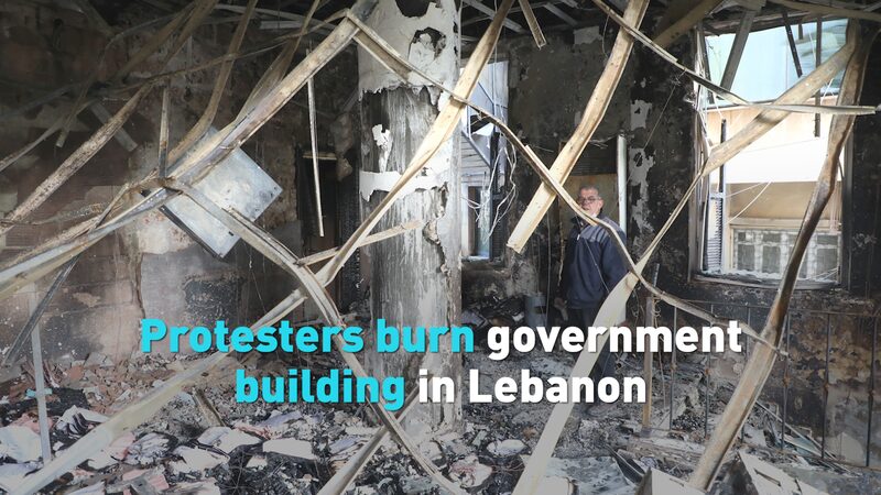 Lebanon Protesters Torch Government Building Amid Strict COVID-19 Lockdown video poster
