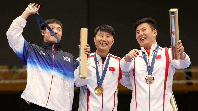 Li_Yuehong_Makes_History_with_China_s_First_Gold_in_Men_s_25m_Rapid_Fire_Pistol - Khabar Asia Li_Yuehong_Makes_History_with_China_s_First_Gold_in_Men_s_25m_Rapid_Fire_Pistol