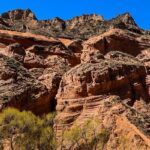 Longzhou Danxia: China's Reddish Sandstone Marvel Stuns Visitors