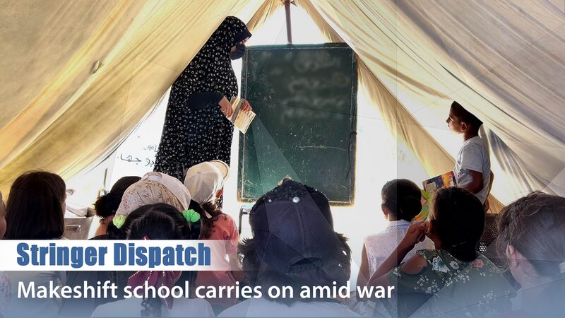 Makeshift_School_Offers_Hope_Amid_Conflict_in_Gazas_Nuseirat_Refugee_Camp_poster - Khabar Asia Makeshift School Offers Hope Amid Conflict in Gaza's Nuseirat Refugee Camp video poster