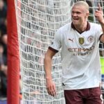 Manchester City's Resilience Keeps Pressure on Arsenal in Premier League Title Race