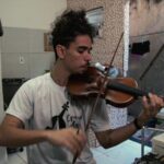 Music Transforms Rio's Slums: Carlos Prazeres Brings Hope Through Symphony video poster