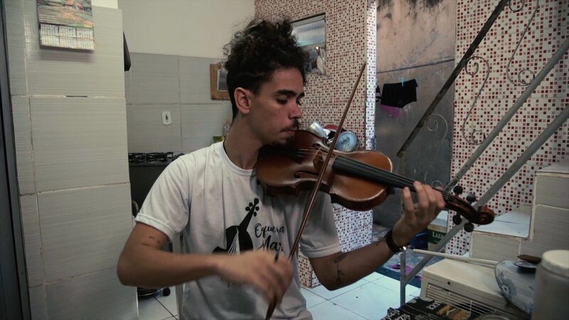 Music_Transforms_Rios_Slums_Carlos_Prazeres_Brings_Hope_Through_Symphony_poster - Khabar Asia Music Transforms Rio's Slums: Carlos Prazeres Brings Hope Through Symphony video poster