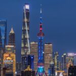 Neon_Nights_in_Lujiazui__Shanghai_s_Financial_Hub_Shines_During_CIIE video poster