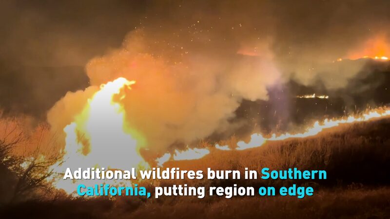 New_Wildfires_Erupt_in_Southern_California__Forcing_30_000_to_Evacuate video poster