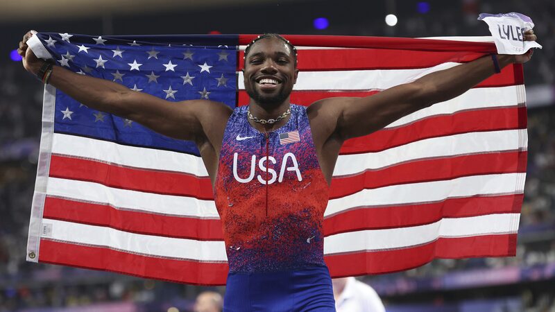 Noah_Lyles_Wins_Olympic_100m_Gold_in_Paris_by_Razor_Thin_Margin - Khabar Asia Noah_Lyles_Wins_Olympic_100m_Gold_in_Paris_by_Razor_Thin_Margin