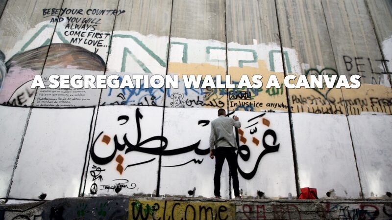 Palestinian Artist Turns Segregation Wall into Canvas of Peace video poster