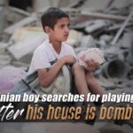 Palestinian Boy Searches for Playing Cards After Home Is Bombed