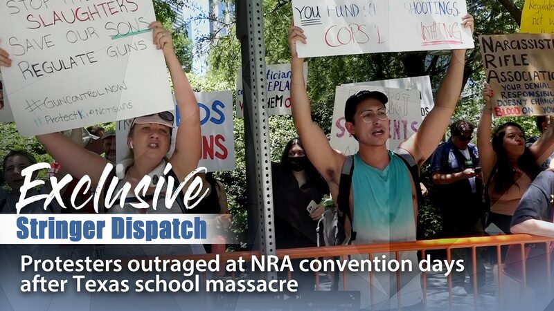 Protesters_Rally_at_NRA_Convention_Days_After_Texas_School_Massacre_poster - Khabar Asia Protesters Rally at NRA Convention Days After Texas School Massacre video poster