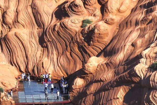 Rain Enhances Danxia’s Wave Valley: A Spectacular Display of Nature’s Artistry Rain_Enhances_Danxia_s_Wave_Valley__A_Spectacular_Display_of_Nature_s_Artistry