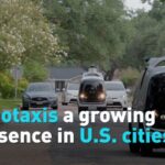 Robotaxis_Gaining_Ground__Autonomous_Vehicles_Expand_in_Major_U_S__Cities video poster