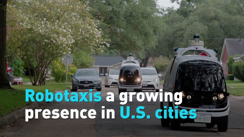 Robotaxis_Gaining_Ground__Autonomous_Vehicles_Expand_in_Major_U_S__Cities video poster