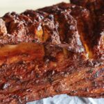 Savor Xinjiang's Whole Roast Lamb: A Culinary Journey video poster