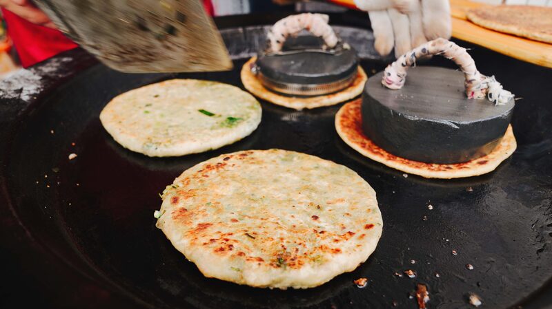Savoring_Huangshans_Breakfast_Treasures_The_Magic_of_Stone_Cake_and_More - Khabar Asia Savoring Huangshan's Breakfast Treasures: The Magic of Stone Cake and More