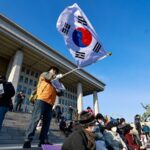 South_Korean_Parliament_Prepares_for_Impeachment_Vote_Amid_Martial_Law_Fallout video poster