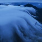 Spectacular 'Waterfall Clouds' Cascade Over Niubei Mountain in Sichuan