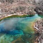 Spring Snow Transforms Jiuzhaigou National Park into a Winter Wonderland