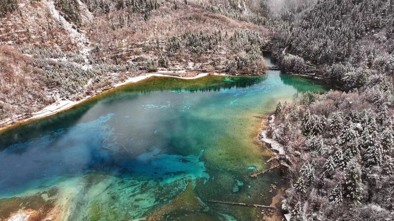 Spring_Snow_Transforms_Jiuzhaigou_National_Park_into_a_Winter_Wonderland - Khabar Asia Spring Snow Transforms Jiuzhaigou National Park into a Winter Wonderland