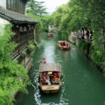 Suzhou's Traditional Wooden Boat Tours Captivate Visitors