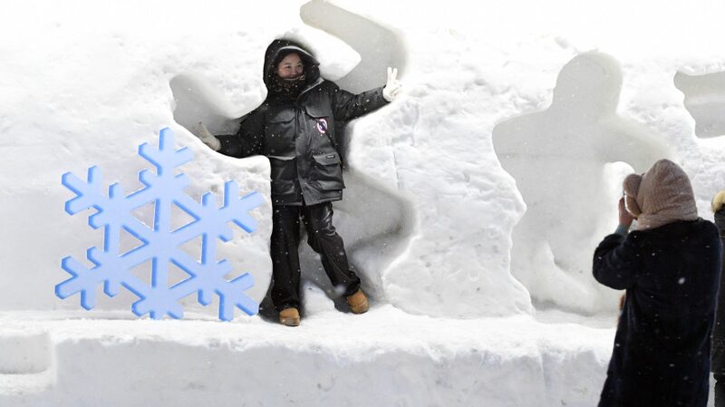 Tourists Flock to Harbin Ice and Snow World Before Seasonal Closure