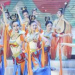 Traditional Costumes Shine at Jiangsu College's 60th Anniversary