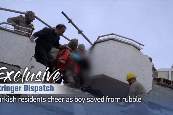 Turkish Residents Cheer as Boy Rescued from Earthquake Rubble Turkish Residents Cheer as Boy Rescued from Earthquake Rubble video poster