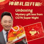 Unboxing_the_CGTN_Super_Night_Gift_Box_with_Host_Zhong_Shi video poster