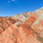 Visitors Flock to Xinjiang's Stunning Danxia Landform During Qingming Festival