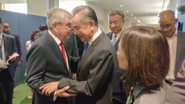 Wang_Yi_Reaffirms_China_s_Support_for_IOC_in_Meeting_with_President_Bach
