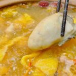 Warm Up with Hainan's Oyster and Chicken Hot Pot: A Winter Treat