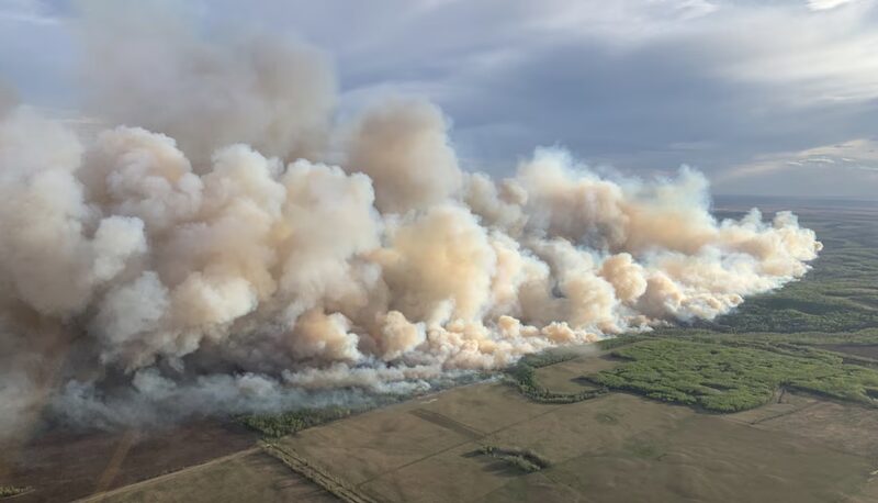 Western_Canadas_Wildfires_Spark_Evacuations_and_Global_Climate_Concerns - Khabar Asia Western Canada's Wildfires Spark Evacuations and Global Climate Concerns