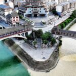 Where Clear Meets Cloudy: The Stunning Confluence of Two Rivers in Guizhou