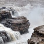 Winter_Spectacle_Hukou_Waterfall_Roars_to_Life_Wowing_Tourists - Khabar Asia Winter Spectacle: Hukou Waterfall Roars to Life, Wowing Tourists