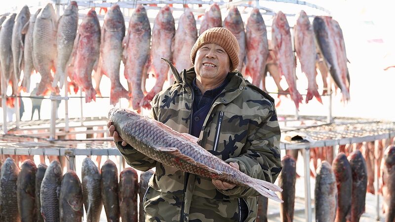 Winter_Wonders_Unveiled__10th_Wolong_Lake_Fishing_Festival_Opens_in_Northeast_China - Khabar Asia Winter_Wonders_Unveiled__10th_Wolong_Lake_Fishing_Festival_Opens_in_Northeast_China