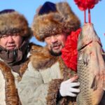 Xinjiang's Ulungur Lake Hosts Annual Winter Fishing Festival Amid Snowy Splendor
