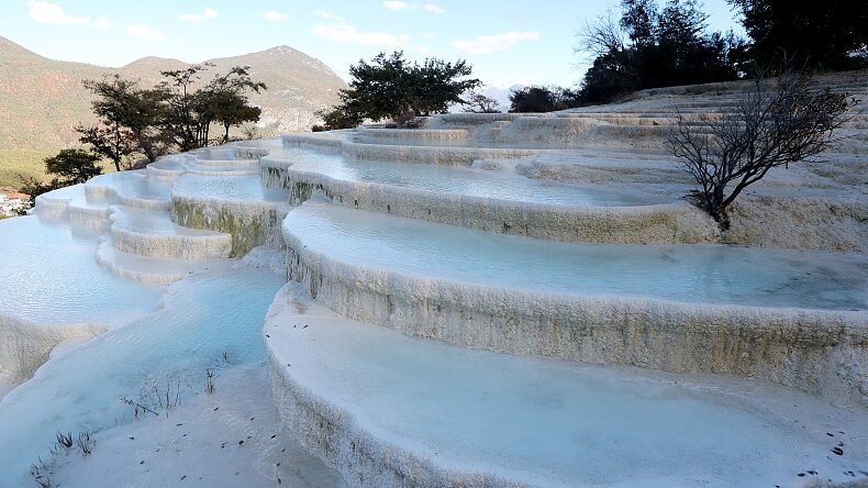 Yunnan's White Water Terrace Shimmers Like a Fairy Tale