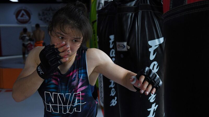 Zhang_Weili_The_Ascent_of_Chinas_First_UFC_Champion_poster - Khabar Asia Zhang Weili: The Ascent of China's First UFC Champion video poster