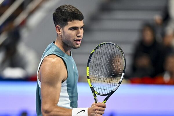 Alcaraz Triumphs Over Cilic in Windy Qatar Open Opener Alcaraz_Triumphs_Over_Cilic_in_Windy_Qatar_Open_Opener