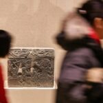Ancient_Liao_Dynasty_Artifact_Depicting_Ne_Zha_on_Display_in_Shenyang_Museum