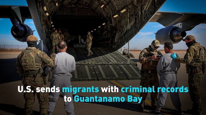 US_Military_Transports_Migrants_with_Criminal_Records_to_Guantanamo_Bay_poster - Khabar Asia US_Military_Transports_Migrants_with_Criminal_Records_to_Guantanamo_Bay video poster