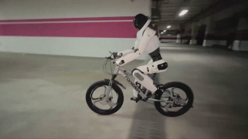 China Unveils Humanoid Robot with Bicycle Skills, Precision Tasks China_Unveils_Humanoid_Robot_with_Bicycle_Skills__Precision_Tasks video poster