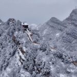 Spring_Snow_Blankets_North_China_s_Peaks_in_Ethereal_Ink_Like_Scenery_poster - Khabar Asia Spring_Snow_Blankets_North_China_s_Peaks_in_Ethereal_Ink_Like_Scenery video poster